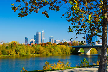 a view of an Indiana skyline at lakeside