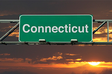 A green welcome to Connecticut road sign