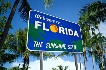 A blue welcome to Florida road sign