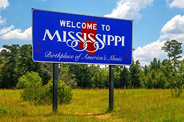 Blue welcome to Mississippi road sign