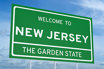 A green welcome to New Jersey State sign